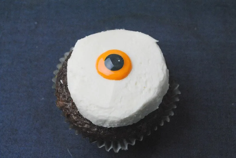 Bloodshot Eyeball Cupcakes Recipe - Your guests won't be able to take their eyes off of these homemade cupcakes decorated to look like bloodshot eyeballs!